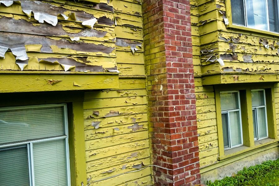 as-is home in El Paso showing old, peeling paint
